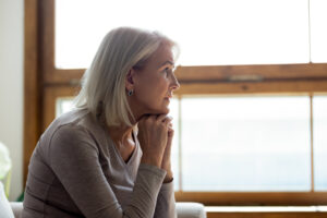 A profile view of a woman with hormonal imbalances and mood disorders